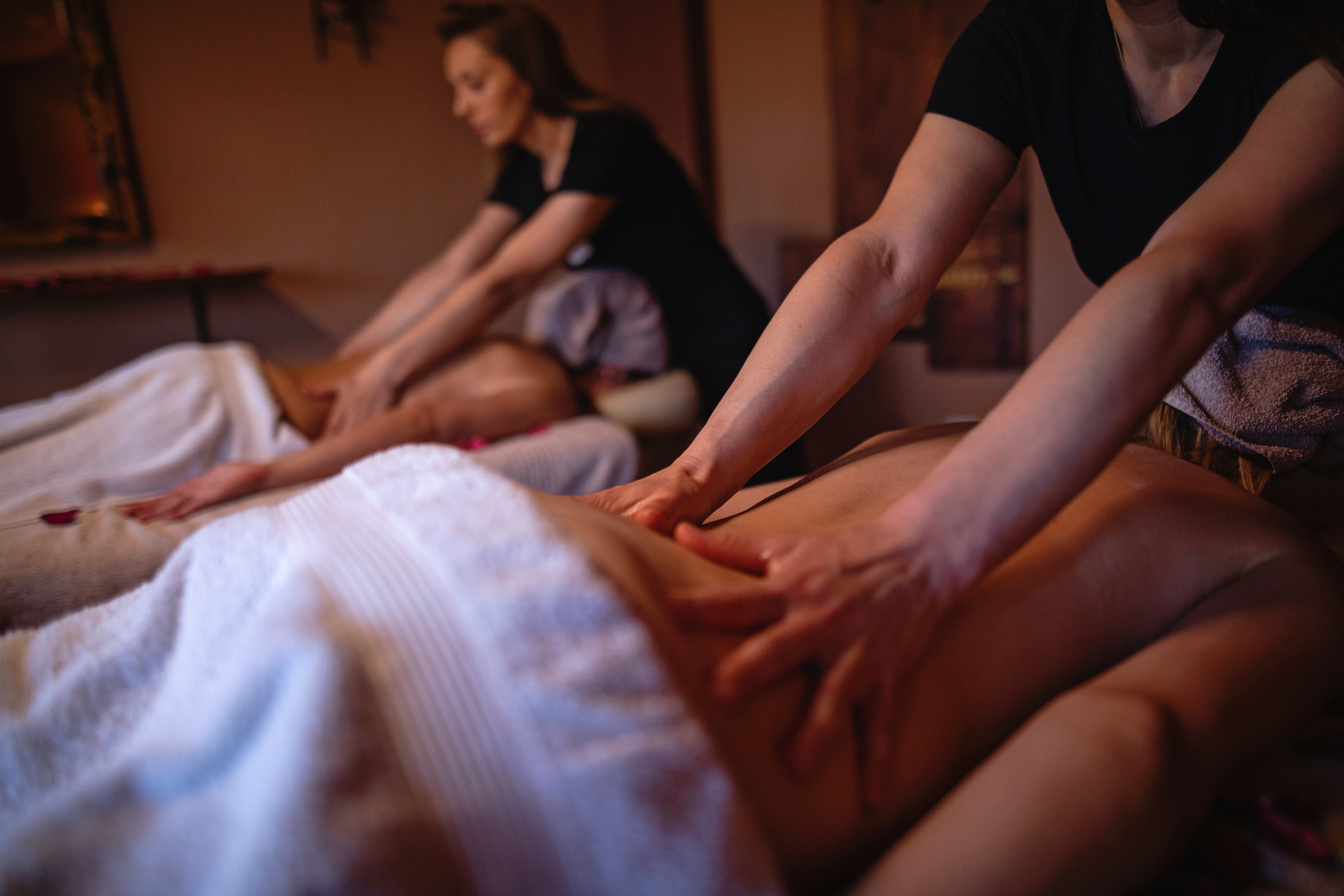 Serene women on a group massage at a beauty spa